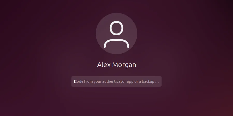 Ubuntu lock screen for Alex Morgan, after the password: the box “Code from your authenticator app or a backup code”.