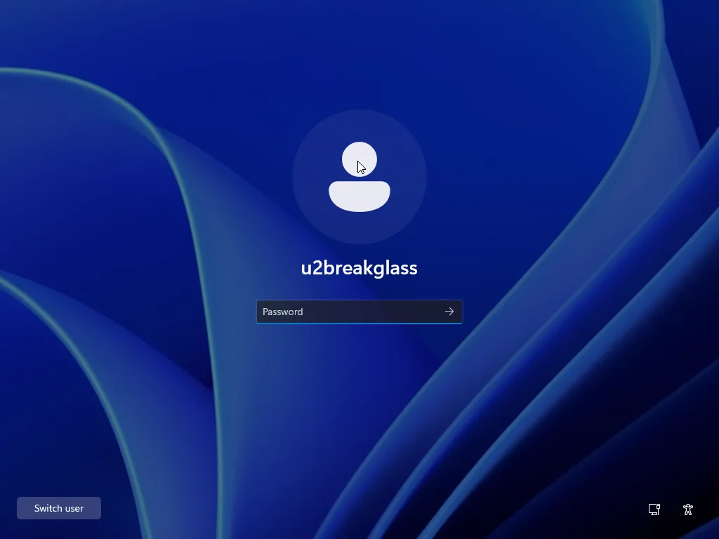The Windows sign-in screen after uninstalling: the u2breakglass tile with a Password field and no “U2 Secured” label.