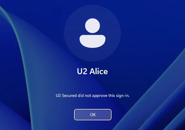 The Windows sign-in screen for U2 Alice showing “U2 Secured did not approve this sign-in.” and an OK button.